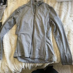 Grey Mondetta work out zip up. Tight to skin fit